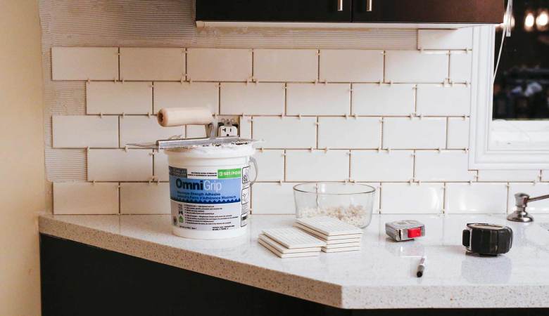 Install subway tile backsplash